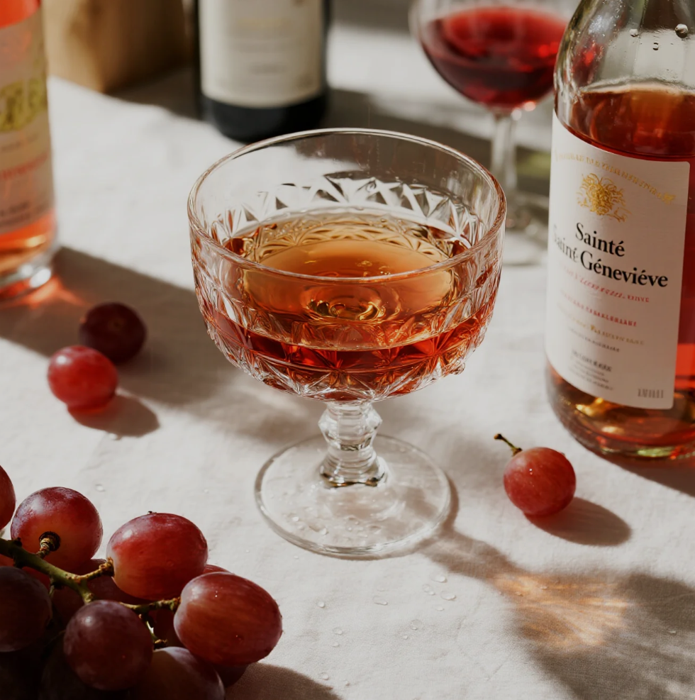 Guests enjoying wine tasting at Sainte Genevieve Winery vineyard